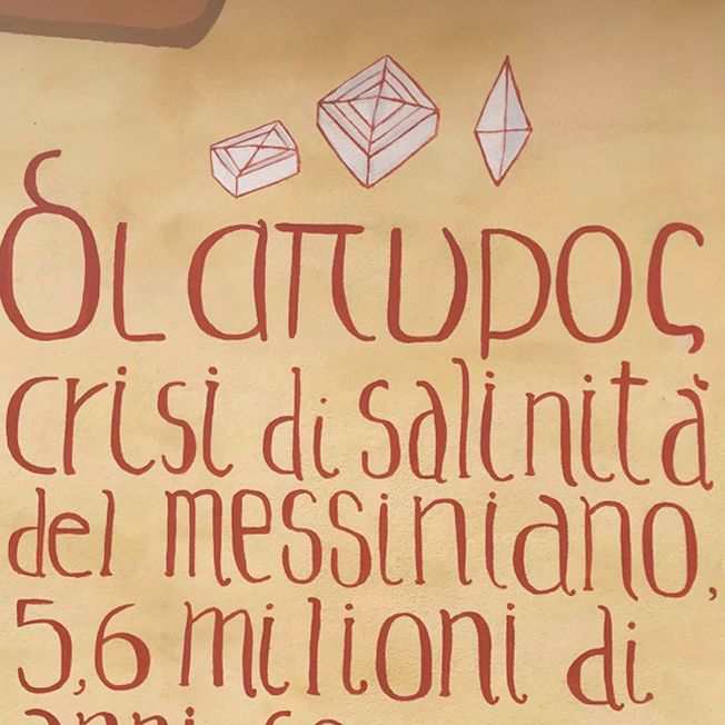 Dipinto murale - didascalia dipinta a pennello con colore rosso su muro, Diapiri 